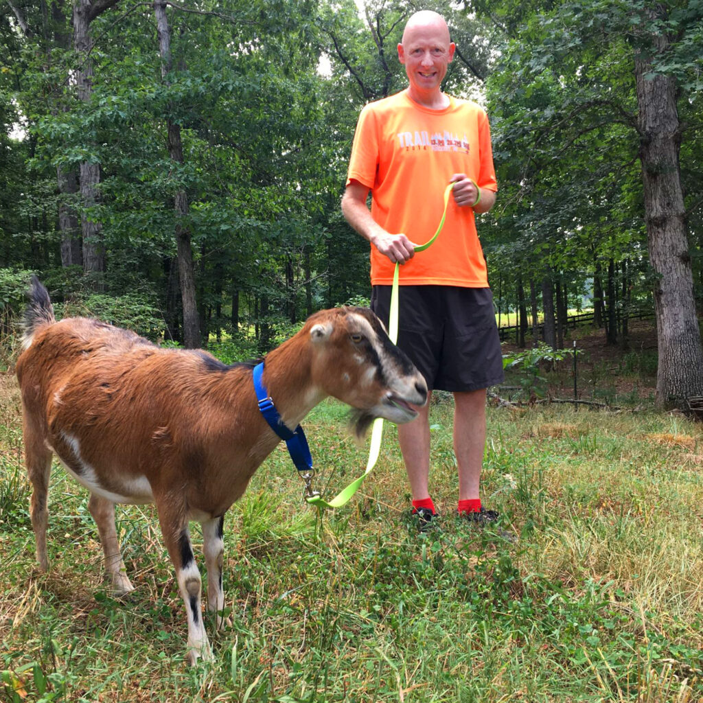 Peter Morville walking a goat